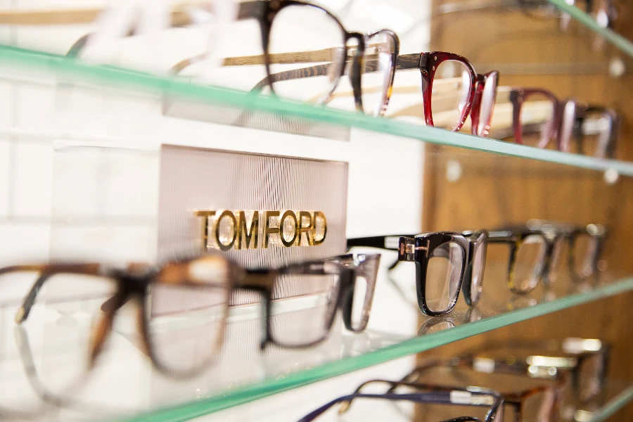Eyewear displayed on glass shelving at See & Be Seen — Liberty Village