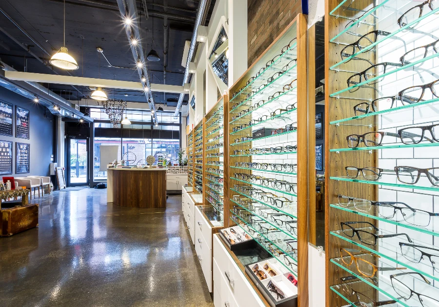 The optical showroom looking toward the storefront at See & Be Seen — Liberty Village